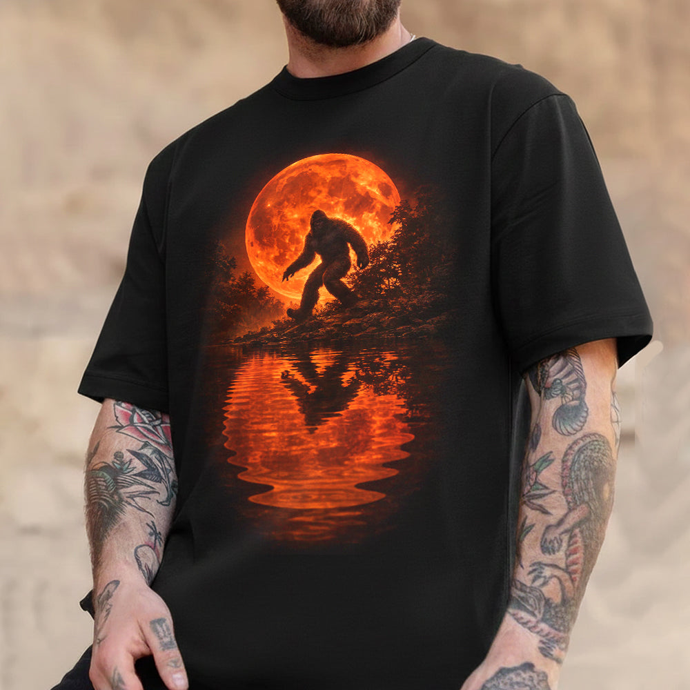 Bigfoot Blood Moon T-Shirt – Sasquatch Silhouette with Fiery Red Moon Reflection, Dark Wilderness Graphic Tee