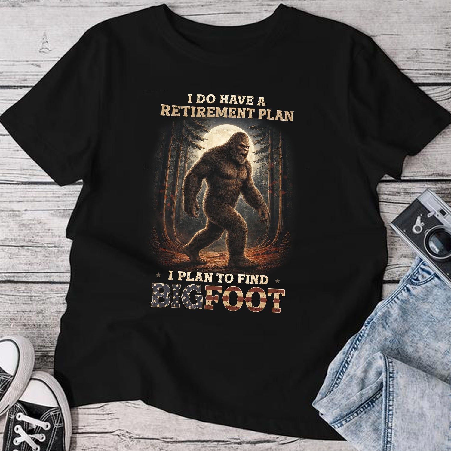 Bigfoot Retirement Plan T-Shirt – Funny Sasquatch Forest Graphic Tee, Wilderness Humor Quote Shirt, Outdoor Adventure & Cryptid Lover Apparel