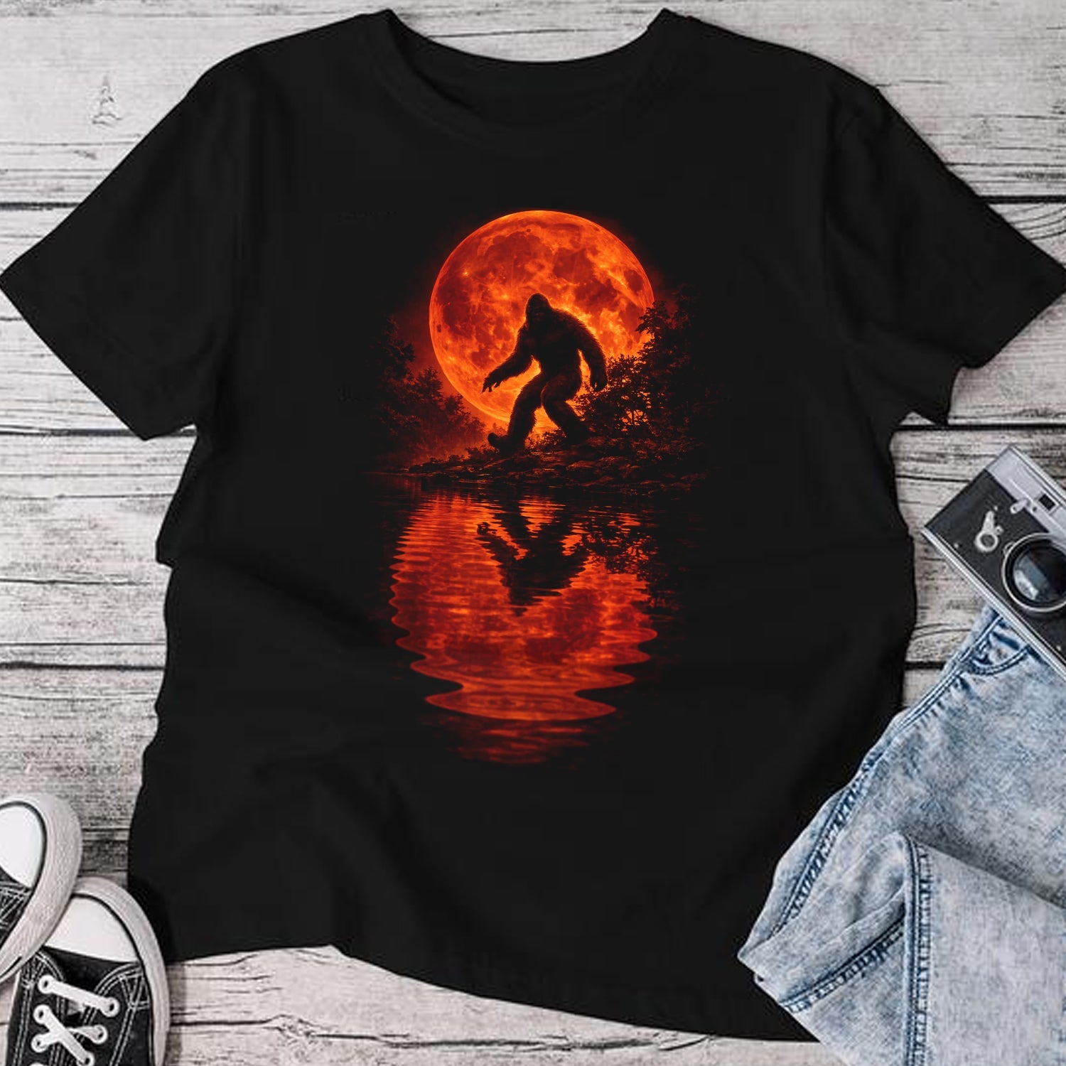 Bigfoot Blood Moon T-Shirt – Sasquatch Silhouette with Fiery Red Moon Reflection, Dark Wilderness Graphic Tee