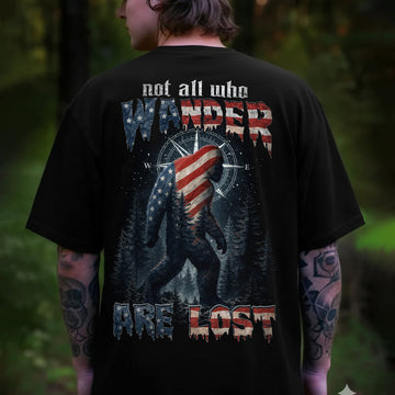 Not All Who Wander Are Lost Bigfoot T-Shirt – Patriotic Sasquatch Wilderness Graphic Tee, American Flag Forest Explorer Shirt, Outdoor Adventure Nature Apparel