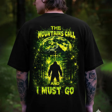 The Mountains Call and I Must Go T-Shirt – Neon Bigfoot Forest Adventure Graphic Shirt for Hikers, Campers & Wilderness Lovers