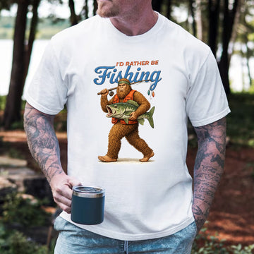 I’d Rather Be Fishing Bigfoot T-Shirt, Sasquatch Fisherman Graphic Tee, Funny Fishing Outdoor Nature Shirt